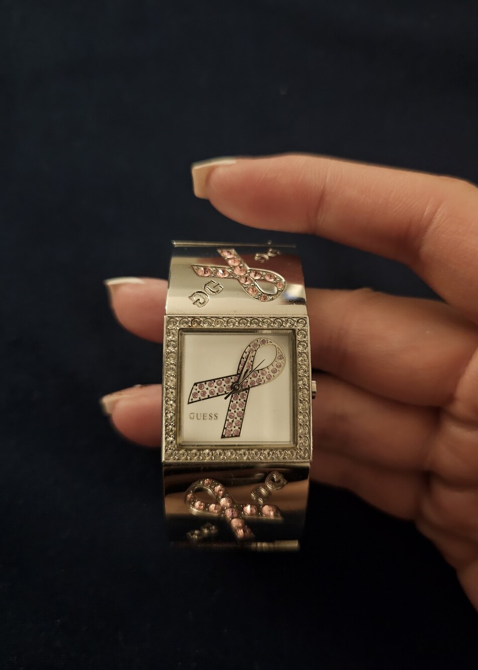 GUESS Women's Silver Tone Pink Ribbon Crystal Bracelet Watch